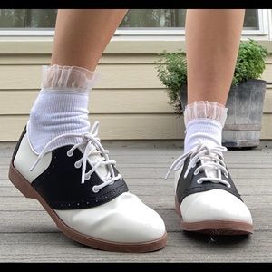 black and white woman's oxfords